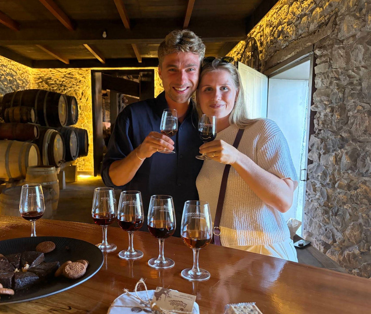 Guests toasting with Madeira wine in the old winery